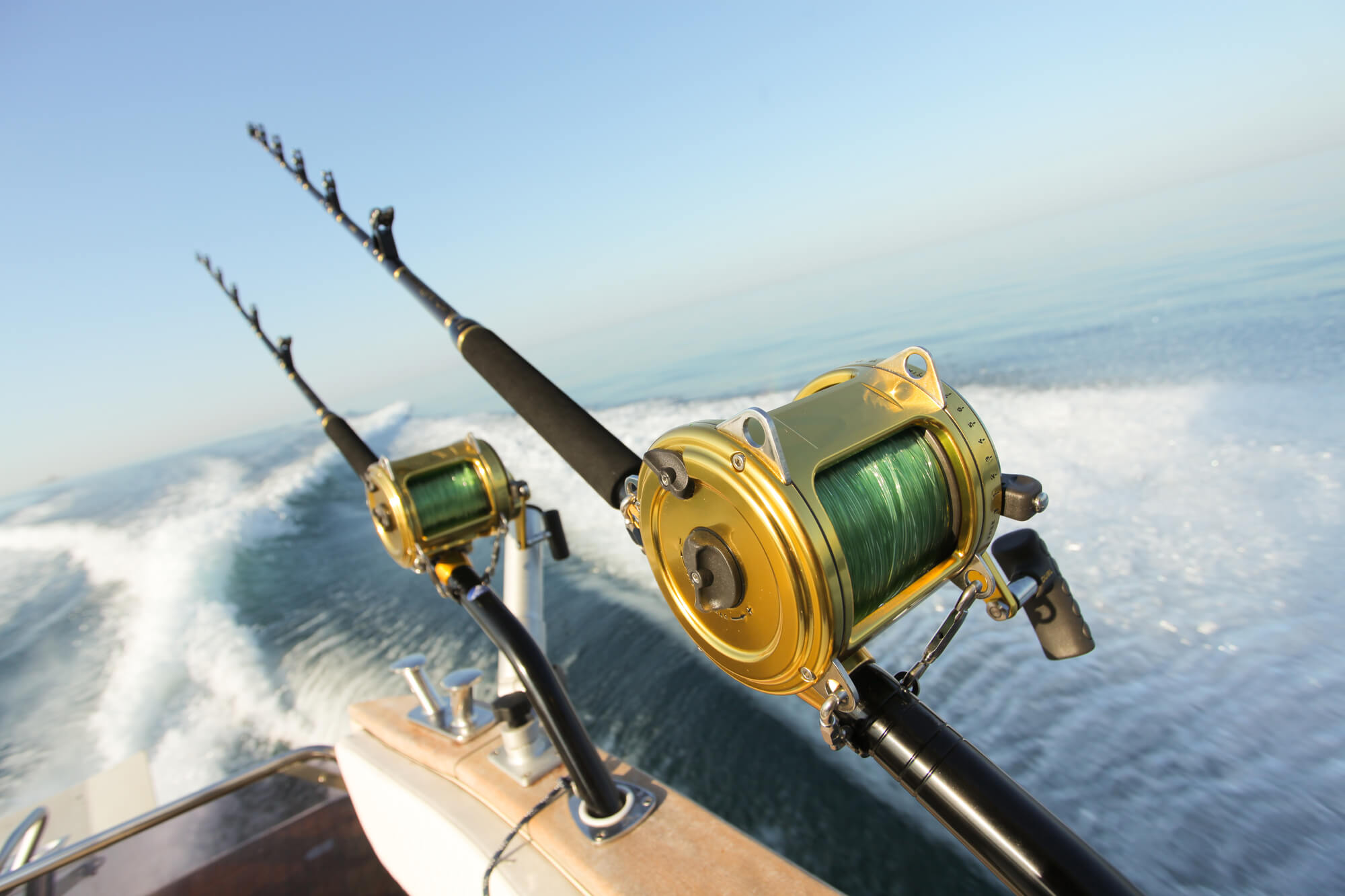 fishing rods on a fishing boat in need of a boat lift in melbourne