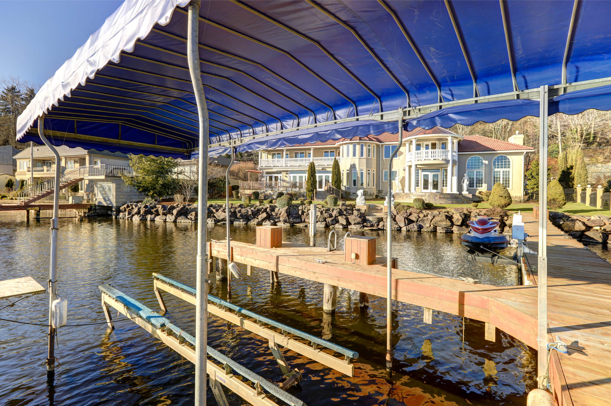 Beautiful wooden dock with a Boat lift in St Petersburg